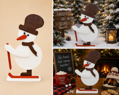 Handmade wooden skiing snowman decoration in large size, with top hat, scarf and skis, shown freestanding as a Christmas display piece