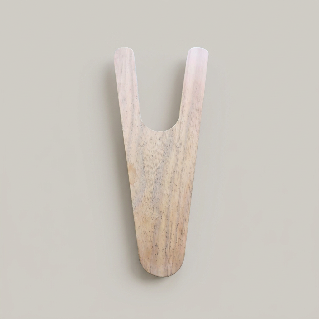 Handcrafted oak Welly Pull boot jack with a deep fork for removing muddy boots