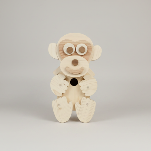 Handcrafted wooden monkey character bird box showing wood grain and carved detail